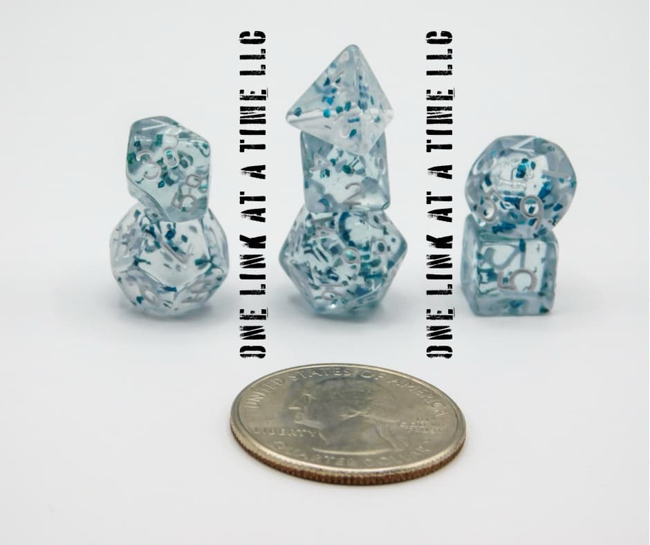 CLEAR WITH BLUE CONFETTI 7PC ACRYLIC MINI DICE SET