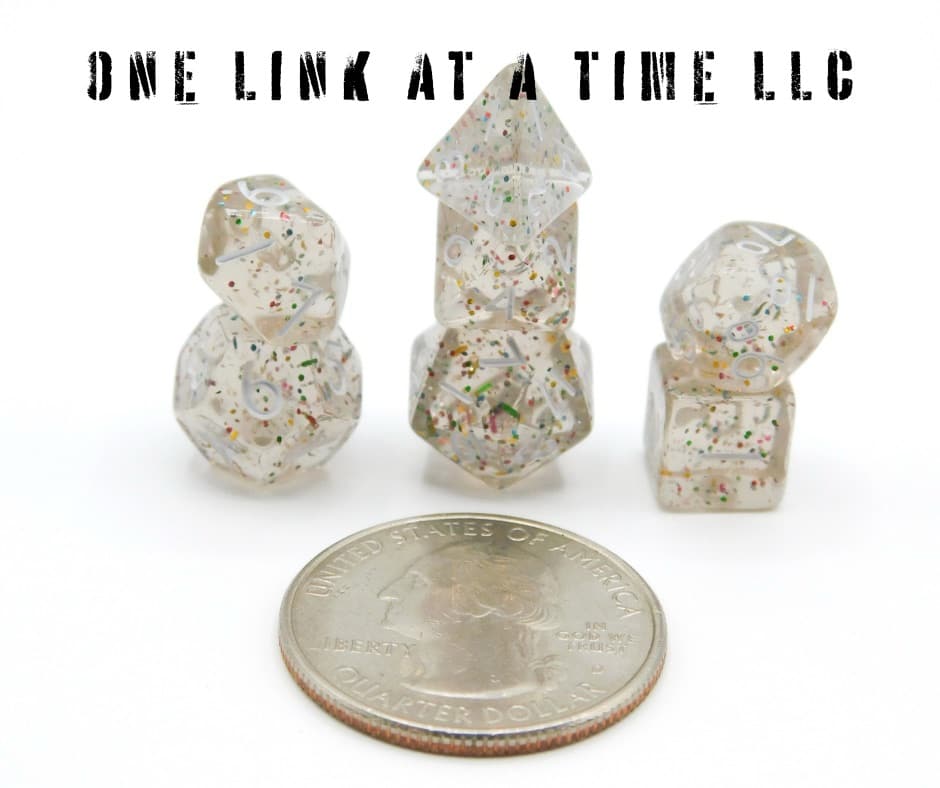 CLEAR WITH RAINBOW CONFETTI 7PC ACRYLIC MINI DICE SET