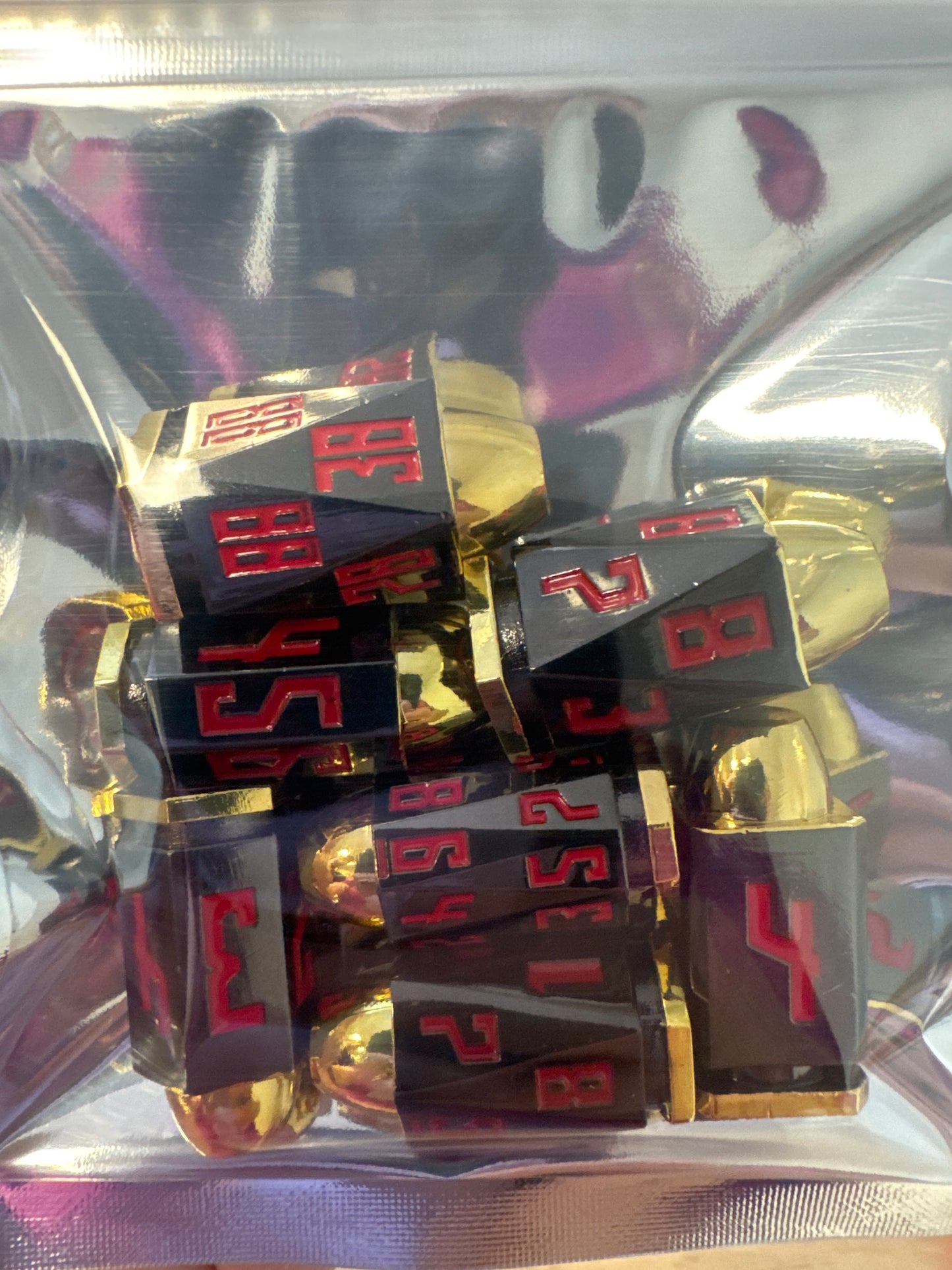BLACK & RED SOLID METAL PEW DICE SET